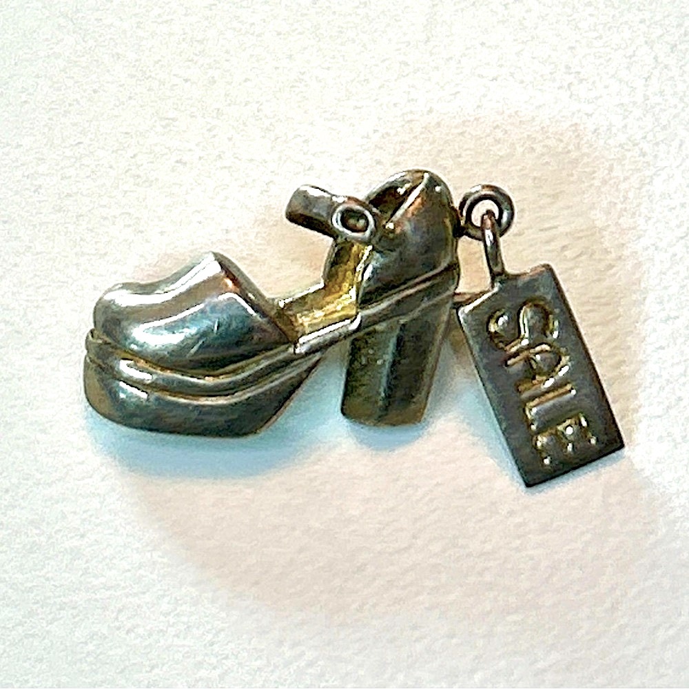 Mini silvertone platform shoe pin with SALE tag